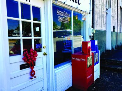 Red ribbons go up for those affected by coronavirus