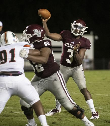 PHOTOS: Ben Russell hosts Huffman in the first game of the season