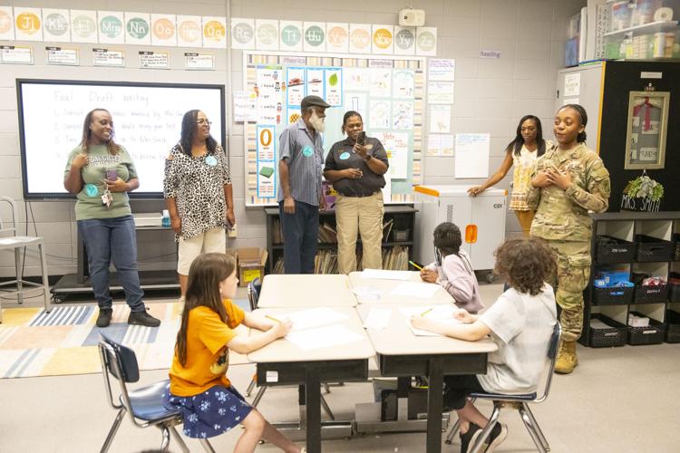 PHOTOS: Wetumpka Elementary student surprised by Veteran sister