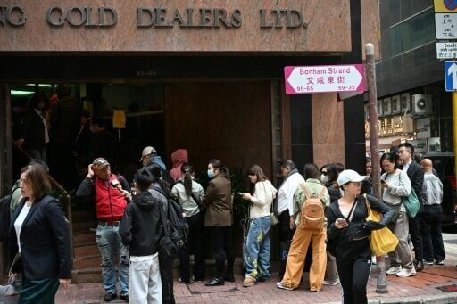 People are queueing at Hong Kong's precious metals shops from the early hours to get their hands on silver bars