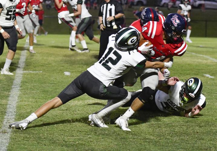 PHOTOS: Edgewood Academy football drops season opener