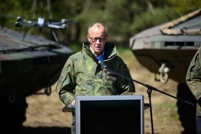 As the transatlantic row unfolded last week, Merz visited German troops