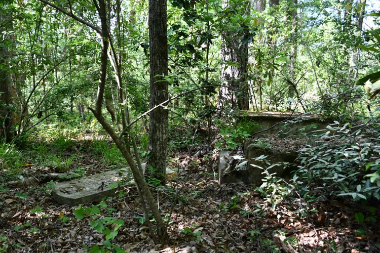 PHOTOS: Dozens of old Youngsville graves lie in the woods of the Russell Mills estate