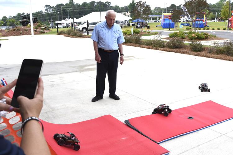 PHOTOS: Russell Marine cuts ribbon on outdoor center