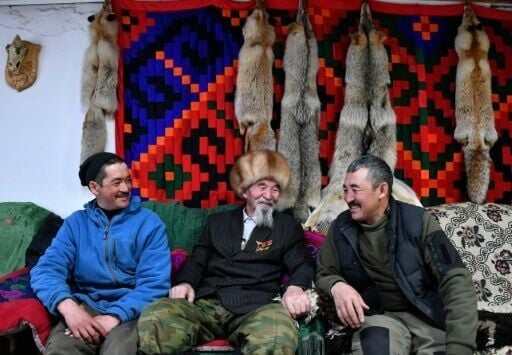 The herd's milky colour is down to the 88-year-old family patriarch Tashtanbek Akmatov (centre)