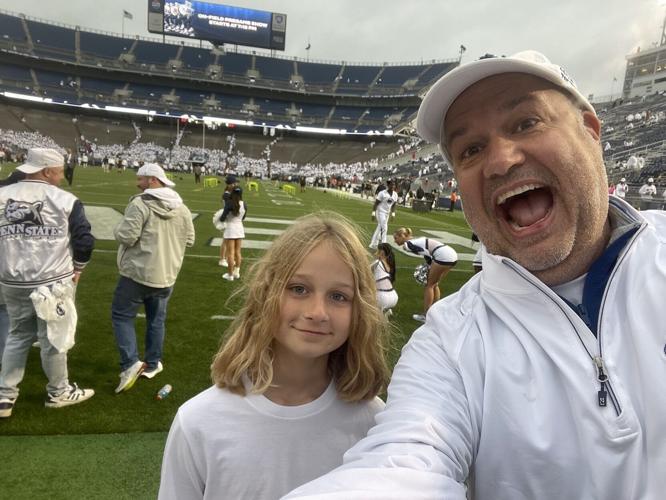 Tim Hayes with his son at the Penn State White Out