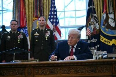 US President Donald Trump signs an executive order on fentanyl in the Oval Office on December 15, 2025