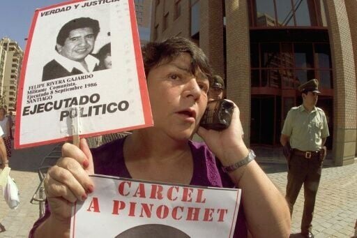 Alicia Lira at a protest in Santiago in 2000, vows to never stop demanding justice for those killed and disappeared under the dictatorship of Augusto Pinochet in Chile