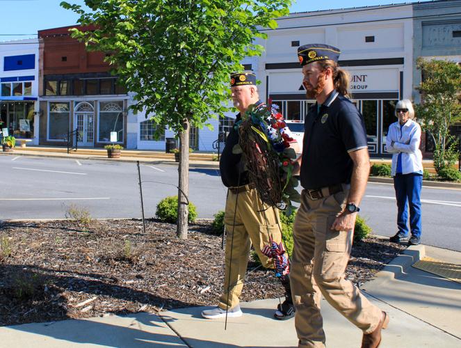 Post 143 lays Memorial Day wreath on courthouse steps