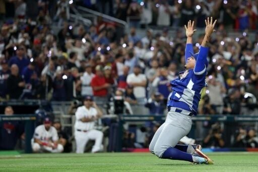 Venezuela pitcher Daniel Palencia celebrates his team's victory over the United States in the World Baseball Classic