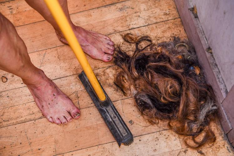 Barefoot barber stopped wearing shoes 20 years ago – even at work