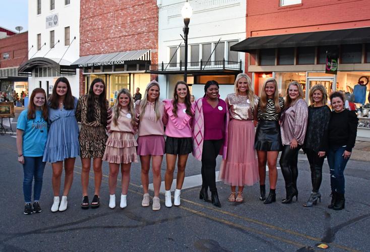 PHOTOS: Models strut down Main Street at 'Sip, Shop and Support'
