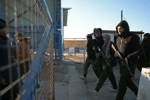 At Al-Hol, an AFP correspondent saw soldiers open the camp's metal gate and enter, while others stood guard