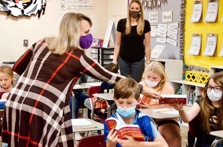 Third graders at TES get dictionaries thanks to Tallassee Rotary Club