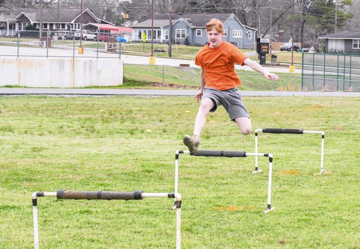 PHOTOS: Dadeville still working despite not having coach