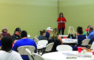 Sandra Fuller gives tourism updates at quarterly luncheon