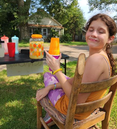 MAKING LEMONADE Students start lemonade stand for school supplies