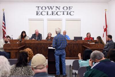 Cliff Williams / TPI Former Eclectic Mayor Gary Davenport speaks to the Eclectic Town Council in opposition of rezoning a parcel to general business. Davenport contends it is spot zoning and illegal.