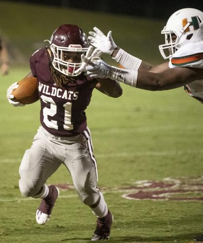 PHOTOS: Ben Russell hosts Huffman in the first game of the season