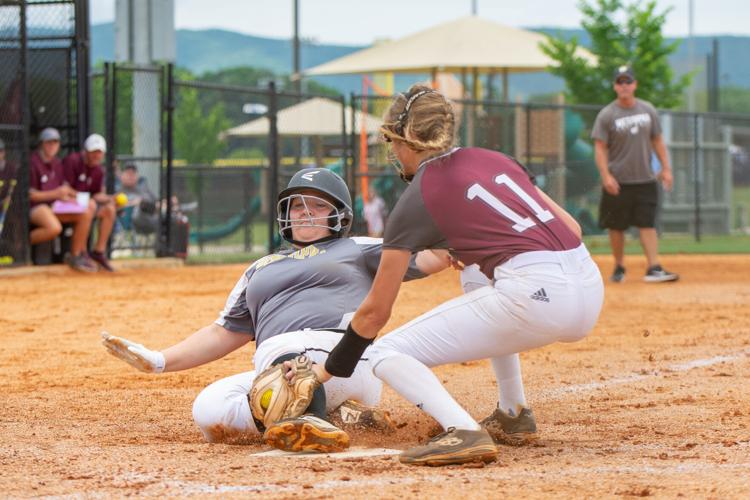 PHOTOS: Area teams play in regional softball tourney