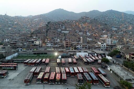 Buses at the Santa Catalina terminal ahead of Sunday's election, in which candidates have made promises to fight crime and extortion.