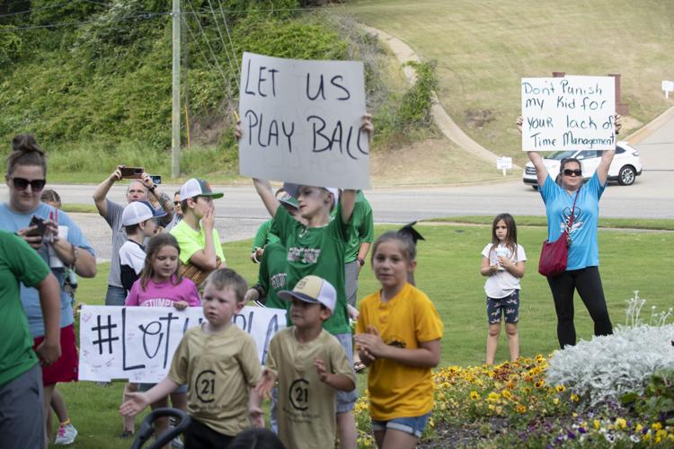 PHOTOS: Children, parents protest for kids to play ball