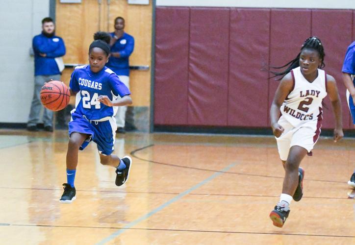 PHOTOS: Alex City Middle School, Central Coosa battle on the hardwood