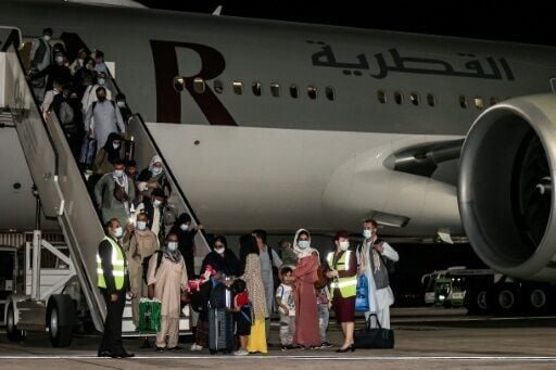 After the US withdrawal in 2021, evacuees from Afghanistan fled to escape the Taliban, seen here landing at Hamad International Airport in Qatar's capital Doha from Kabul