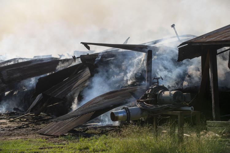 PHOTOS: Hay barn fire at Bar J Farms