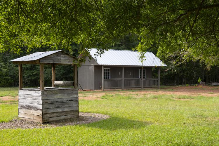PHOTOS: Talisis Historical Society adds bathrooms to Patterson Cabin