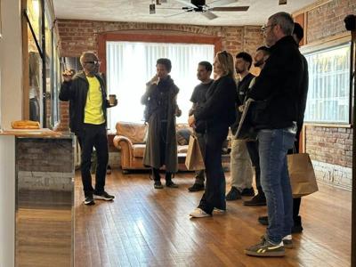 John Collins leads a tour of Detroit’s Exhibit 3000 for visitors from Detroit, New York, Spain and Germany.
              John Collins, CC BY-ND
