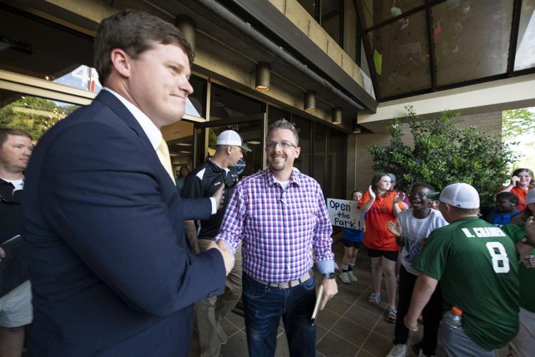 PHOTOS: Children, parents protest for kids to play ball