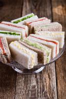 Ribbon sandwiches on cake stand