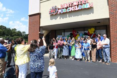 Cliff Williams / TPI Millbrook officials and members of the Millbrook Chamber of Commerce joined Dentistry for Children as the business cut the ribbon on a Millbrook location.