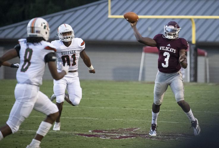 PHOTOS: Ben Russell hosts Huffman in the first game of the season