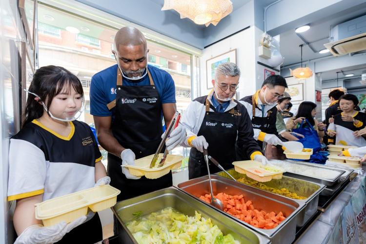 NBA legends Stephon Marbury and Cuttino Mobley join executives from Las Vegas Sands and Sands China, Sands Cares Ambassadors, and Fuhong members to assemble and distribute boxed lunches at Health and Wellness Day, delivering care and warm wishes to loca...