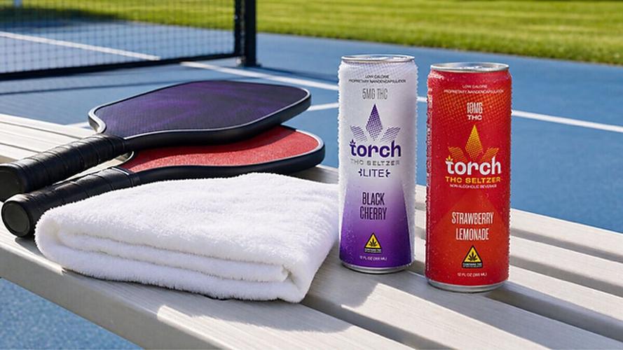 Torch Beverages THC Seltzer courtside in Black Cherry Lite (5mg THC) and Strawberry Lemonade (10mg THC). Torch is the official THC beverage of Major League Pickleball for the 2026 and 2027 seasons.