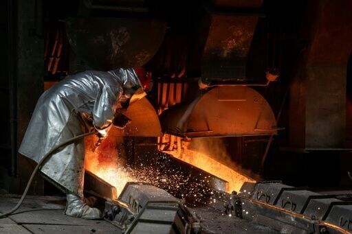 Smelter workers process copper at the Glogow plant in southwestern Poland, owned by KGHM