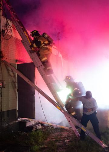 Photos: Firefighters battle blaze at McGhee Furniture Warehouse