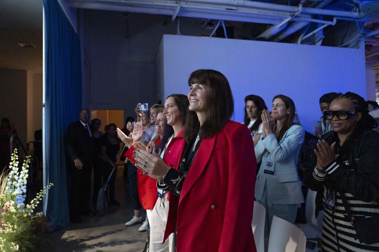 Audience celebrates as Andrea Brimmer, Ally Chief Marketing and Public Relations Officer, and iHeart’s Sarah Spain discuss achieving the 50/50 Pledge to hit equal spend across men’s and women’s sports media at Deep Blue Business of Women’s Sports Summit...