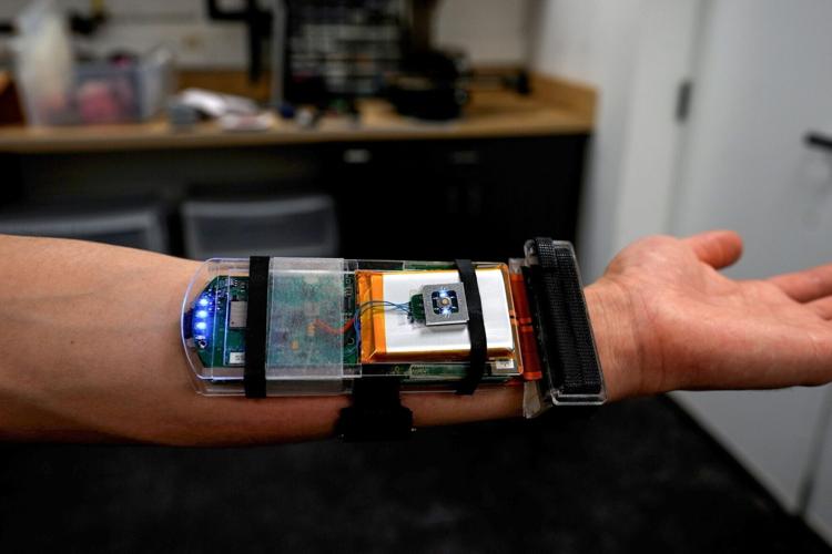 New wristband enables wearers to control robotic hand so that it can play piano