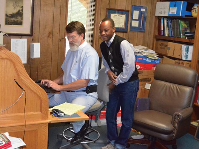 Eclectic man helps plan Congolese town from afar