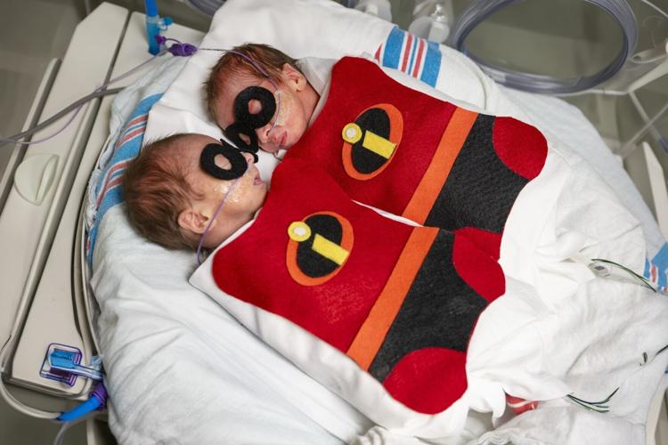 Babies in NICU don spooky outfits for Halloween