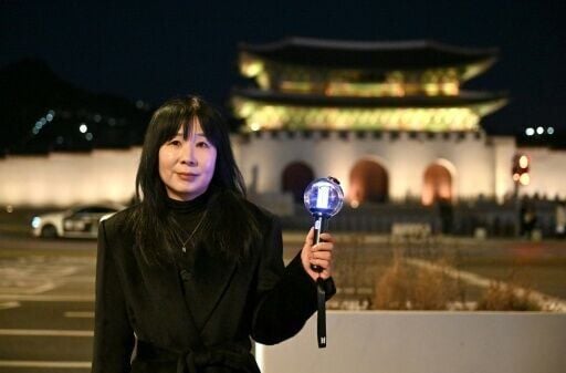 South Korean professor Lee Ji-young was among those who held BTS light sticks during pro-democracy protests