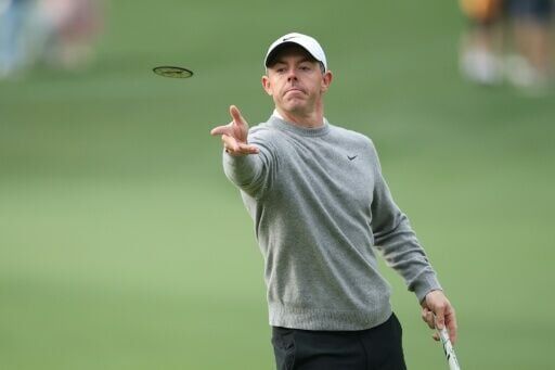 Defending champion Rory McIlroy, the world number two from Northern Ireland, practices putting on the sixth hole during a practice round ahead of the 90th Masters