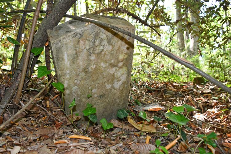 PHOTOS: Dozens of old Youngsville graves lie in the woods of the Russell Mills estate