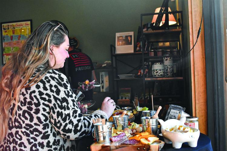 Locals try various wines at Grain & Leaf