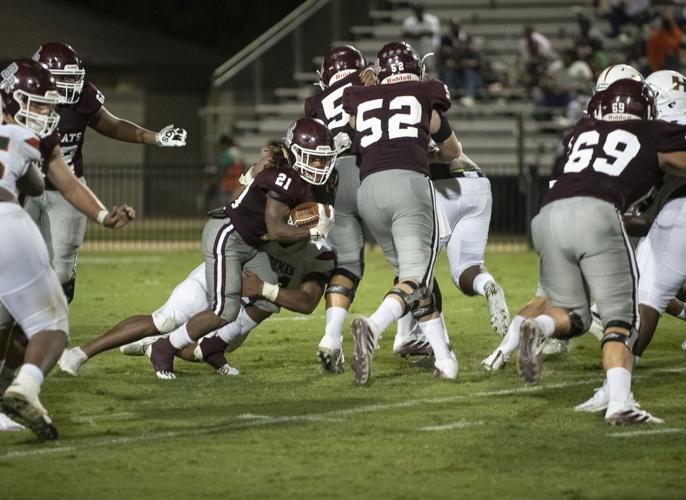 PHOTOS: Ben Russell hosts Huffman in the first game of the season