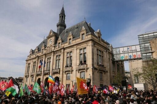 Demonstrators gathered on the steps of Saint-Denis's town hall