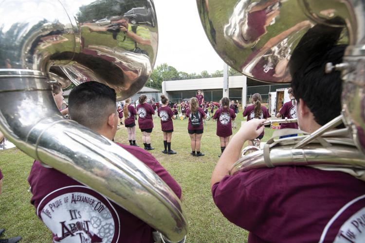 PHOTOS: Ben Russell hosts Huffman in the first game of the season